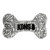 Black and white bone-shaped plush dog toy with printed pattern.