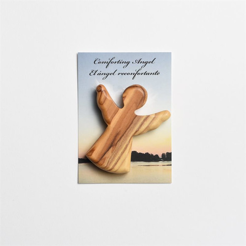 Image shows a handheld Comfort Angel carved by skilled artisans in Bethlehem, making every angel unique in grain and character. 