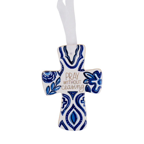 Image shows a hand-painted wall cross art with an inscription inspired by 1 Thessalonians 5:17.
