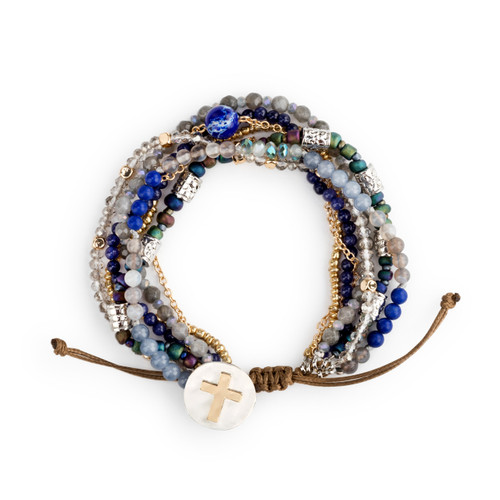 The image shows an indigo beaded prayer bracelet.