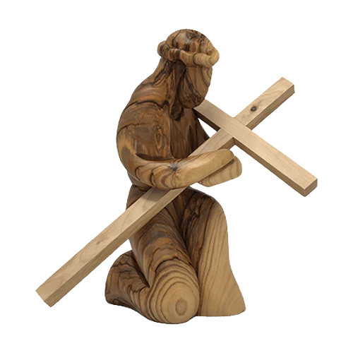 The image shows a kneeling Jesus figurine made of olive wood.