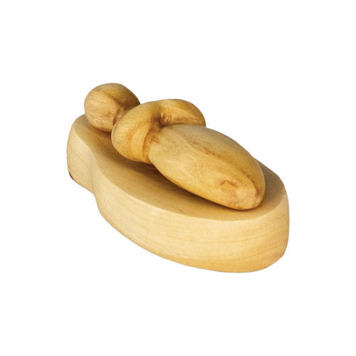 The image shows Baby Jesus in a manger created from olive wood. 