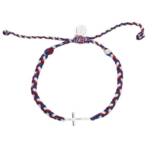 The image shows a 250th Red, White & Blue, and Silver Cross Bracelet on a flat surface.