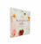 Image shows the book at an angle featuring the title and floral pattern