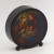 Image shows this Holy Family Stained Glass Round Panel piece without the light on.