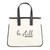 The image shows a mini canvas tote with the message, Be Still and Know.