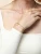 Luminous Gold Cross Tennis Bracelet 7"