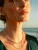 Luminous Gold Cross Tennis Necklace