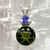 Natural Moldavite with Tanzanite set in Sterling Silver Natural Moldavite with Tanzanite set in Sterling Silver