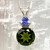 Natural Moldavite with Tanzanite set in Sterling Silver Natural Moldavite with Tanzanite set in Sterling Silver