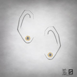 continuum pave diamond solitaire earrings on ears