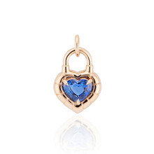 heart shaped sapphire padlock pendant in 18 karat gold front view; sapphire heart pendant