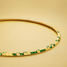 knife edge tennis necklace with tourmalines in 18 karat yellow gold