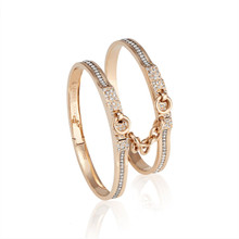 oath double cuff bracelets in white gold with black rhodium with pave diamond row and pave latch; pave diamond cuff bracelets