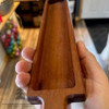 The Cheese and Crackers Charcuterie Board is the ideal serving piece for your next cheese-tasting party. It's made of solid mahogany and comes with a convenient hole in the handle for hanging. Uniquely shaped.