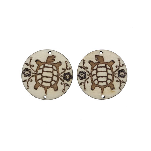 Turtle Wooden Centers engraved on a circle. We are proud to say all our wooden centers/cabs are handcrafted on the Tuscarora Nation. We precision-engrave our original designs onto each pair to provide you with a creative basis for your beadwork. Our customers find that incorporating our cabs into their beadwork allows them to create unique pieces and increases their sales.