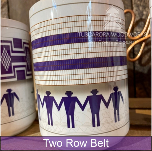 This Two Row Wampum mug makes a great gift for the coffee or tea drinker that you know; it's built to last and holds up to 15 ounces of your favorite beverage. White Mug, purple designs.