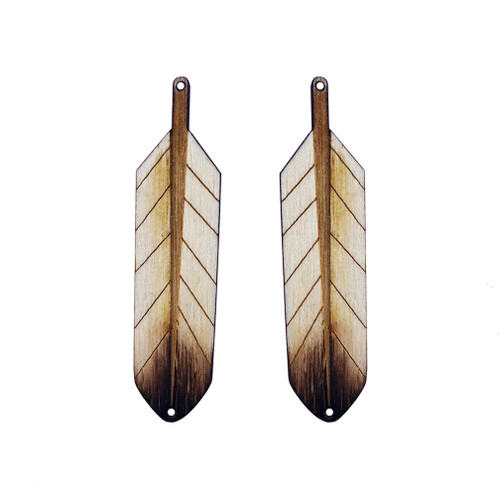 Wooden Feather Centers, two single feathers. We are proud to say all our wooden centers/cabs are handcrafted on the Tuscarora Nation. We precision-engrave our original designs onto each pair to provide you with a creative basis for your beadwork. Our customers find that incorporating our cabs into their beadwork allows them to create unique pieces and increases their sales.