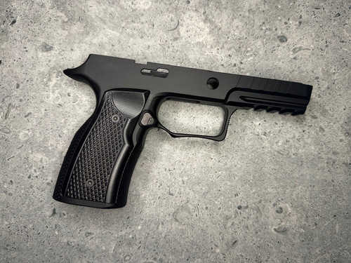 SBGM09-BLK. Sharps Bros grip module for the P320 - Blacked out aluminum