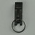 Extra Wide Secure-A-Key Belt Key Holder Slip On Belt Black. Slides through belts up to 2-1/4 inches wide. Made in the U.S.A. from black powder coated stainless steel. Popular with public safety officials, prison guards, law enforcement, police and security.