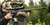 Shooter using a rifle mounted into MDT JAE-G5 Chassis