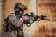 Tactical operator with a Surefire Mini Scout Light Pro M340