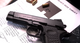 Wilson Combat SFT9 4.25" 9mm Pistol 15-Round - Black shown on test target