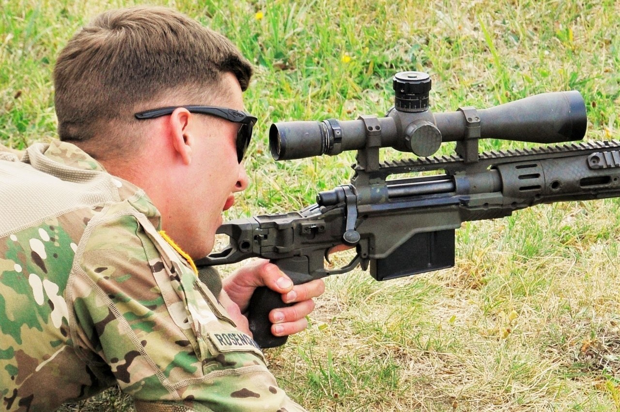 U.S. Army sniper firing the M2010 Enhanced Sniper Rifle prone on a range