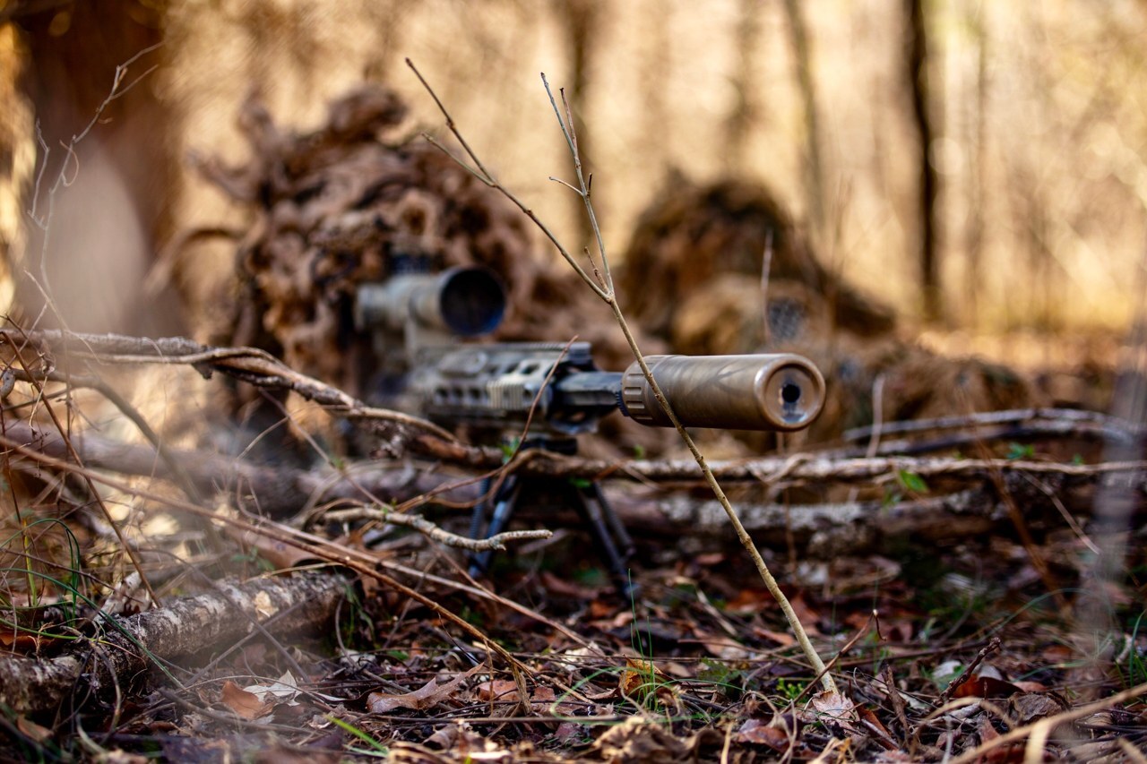 U.S. Army soldiers fire the M24 Sniper Weapon System, the M2010's predecessor