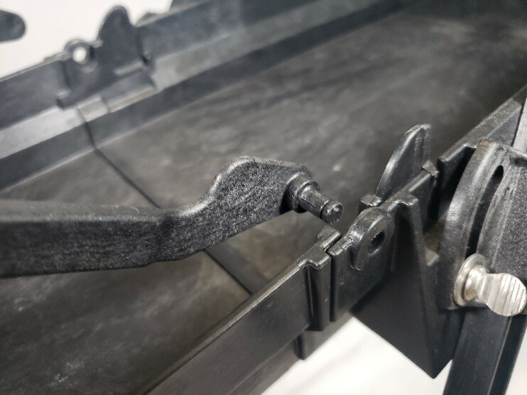 sluice support arm pivot lock 1