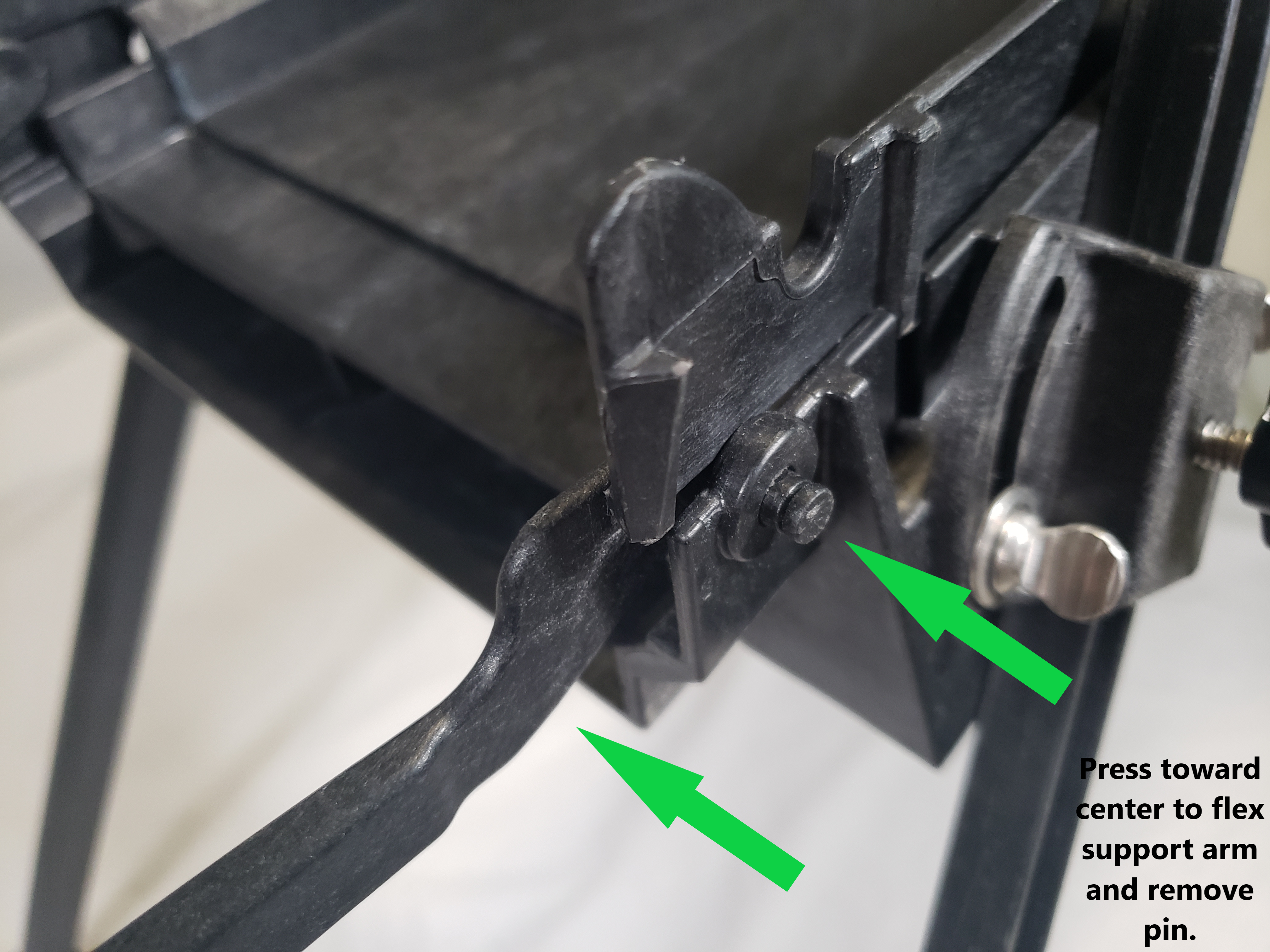 hopper support arm pivot 2
