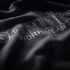 Scruffs Tamworth Logo Hoodie close-up showing Scruffs Workwear chest logo on black fabric