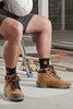 Scruffs Stratton Safety Boots ÃƒÂ¢Ã¢â€šÂ¬Ã¢â‚¬Å“ tan safety boots worn on site beside a step ladder