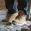 Scruffs Ridge tan safety boots worn on site with lace fastening, padded ankle support and rugged work sole