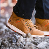 Scruffs Nevis Safety Boots ÃƒÂ¢Ã¢â€šÂ¬Ã¢â‚¬Å“ close-up of tan safety boots worn on rubble