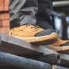Scruffs Solleret Safety Boots Ã¢â‚¬â€œ tan safety boots worn on a work platform