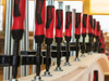 Bessey TGK Malleable Cast Iron Screw Clamp – multiple screw clamps securing a curved wooden assembly