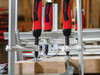 Bessey GZ All-Steel Screw Clamp – multiple all-steel screw clamps holding a precision workpiece