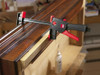 Bessey DuoKlamp – one-handed clamp securing a workpiece to a bench edge