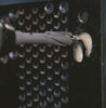HMT Speedlube Drilling & Tapping Spray Aerosol – spray lubricant being used on perforated metal