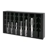 Black foam tray displaying oversized taps for galvanised fittings