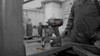 VersaDrive cordless impact wrench standing on a steel workbench in a workshop