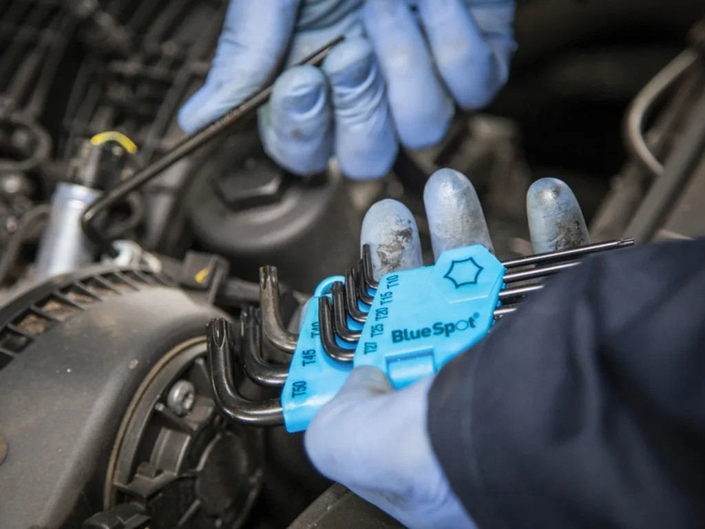 BlueSpot Tools 9 piece long arm TORX key set in holder being used in an engine bay