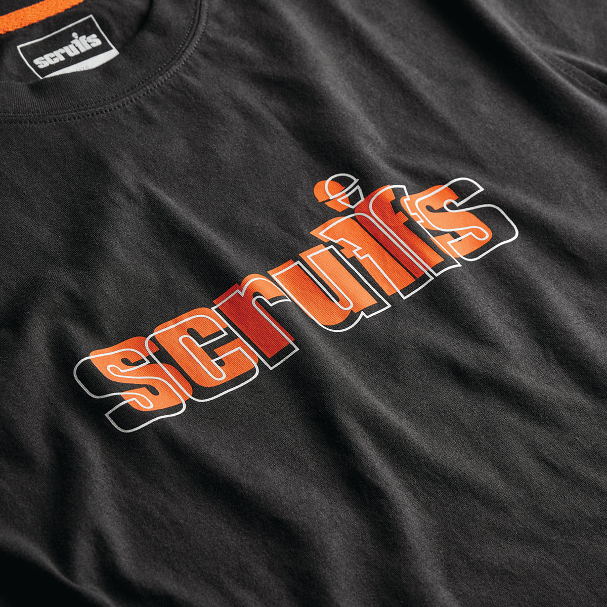 Scruffs Houghton Worker T-Shirt close-up of orange retro outline logo print on black cotton