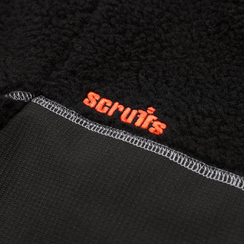 Scruffs Borley Sherpa Fleece close-up showing orange Scruffs logo embroidered on black sherpa fabric