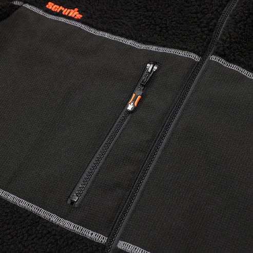 Scruffs Borley Sherpa Fleece close-up showing zipped chest pocket, contrast stitching and orange Scruffs branding