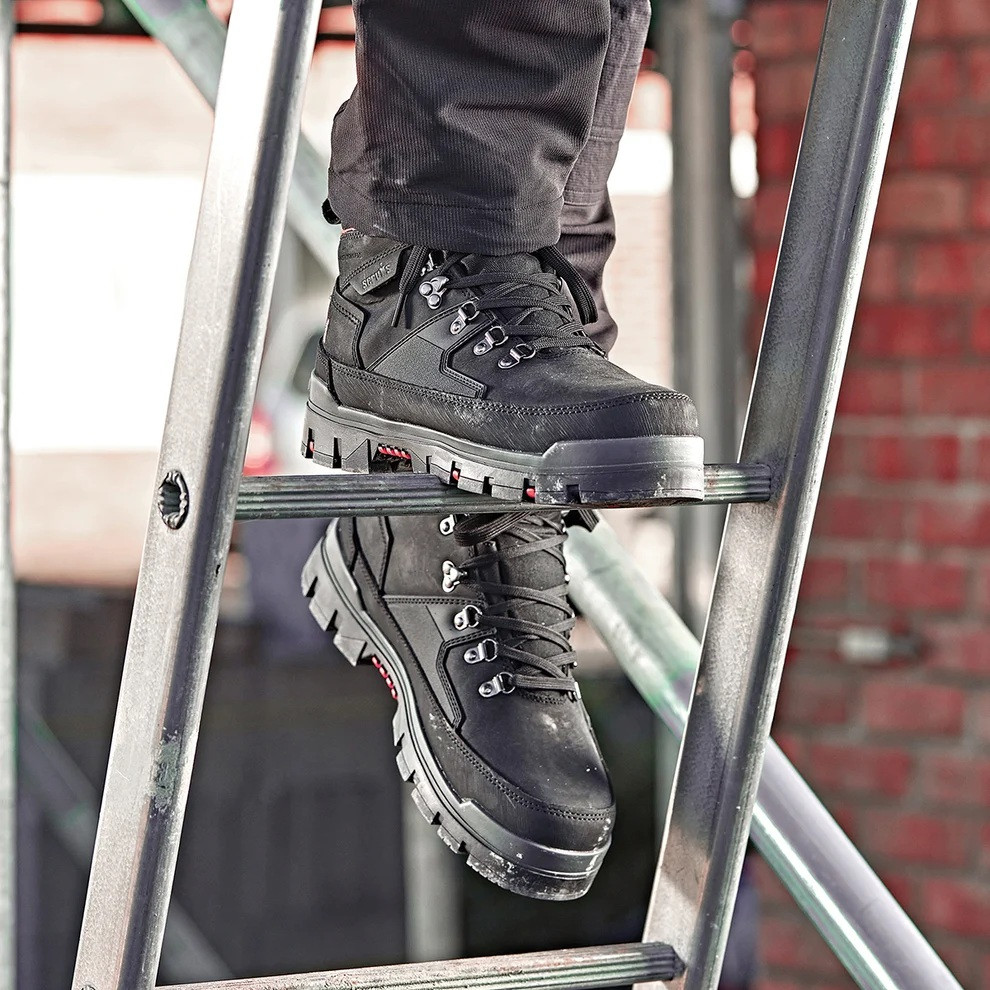 Scruffs Rugged Safety Boots Ã¢â‚¬â€œ black safety boots worn while standing on a ladder