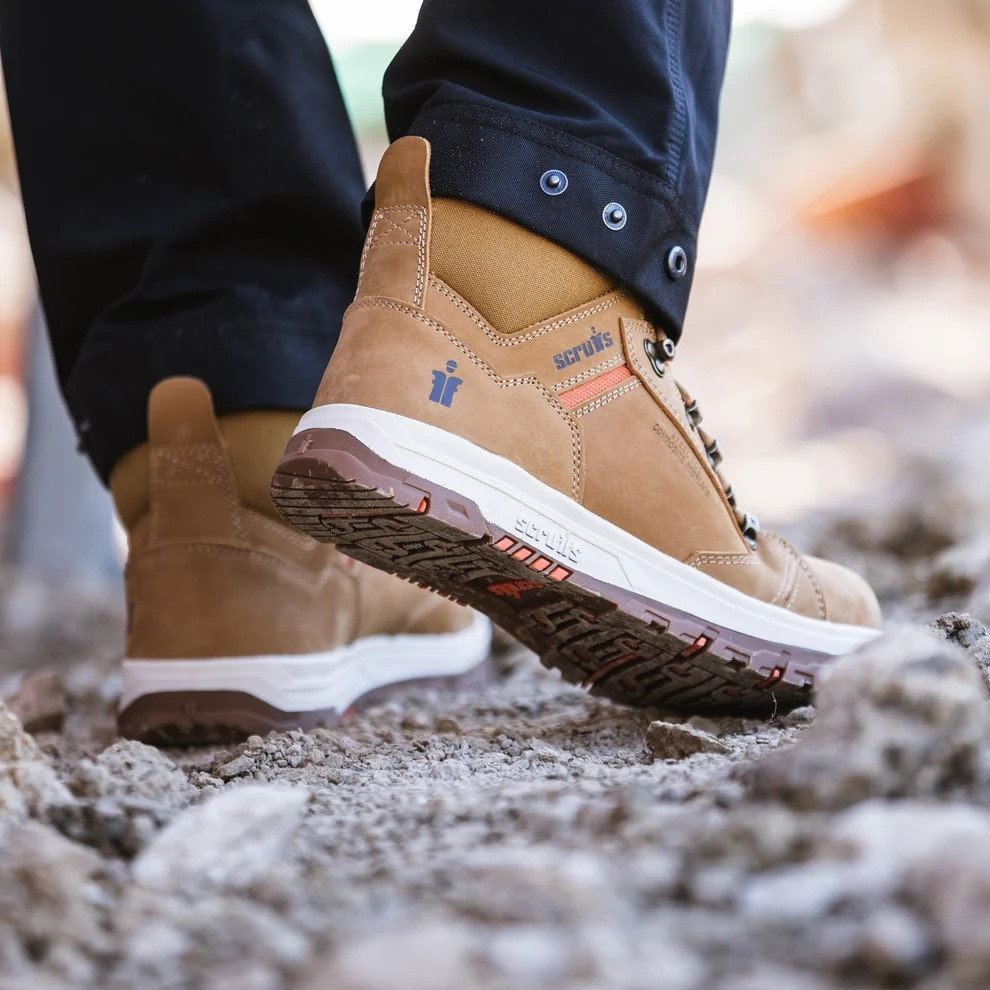 Scruffs Nevis Safety Boots Ã¢â‚¬â€œ tan safety boots worn while walking over rough ground