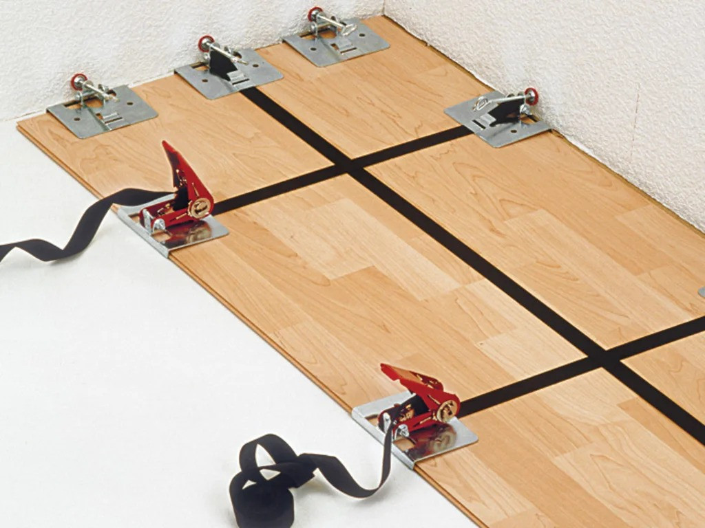 Bessey SVH400 Strap Flooring Tool – multiple strap flooring tools tensioning a large floor installation