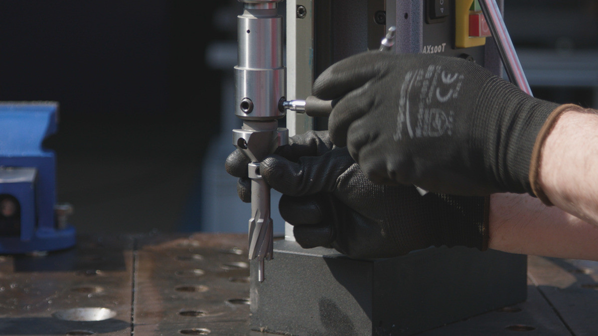 HMT Tungsten Carbide MultiSink Metric – tungsten carbide countersink tool cutting holes in steel plate